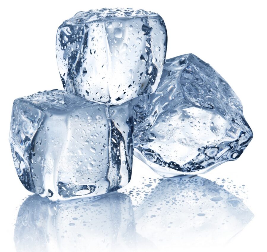 Three Ice Cubes Are Sitting Table,