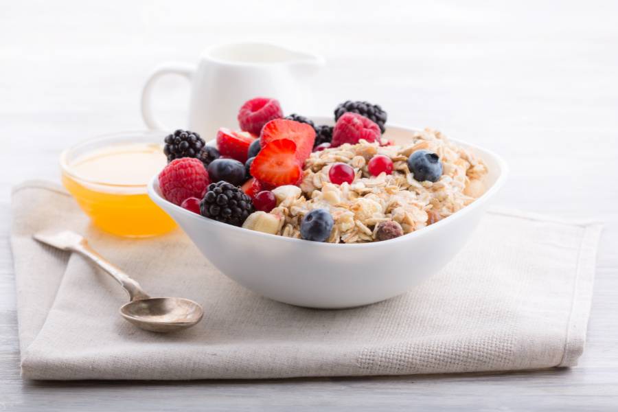A Bowl of Porridge and Fruits