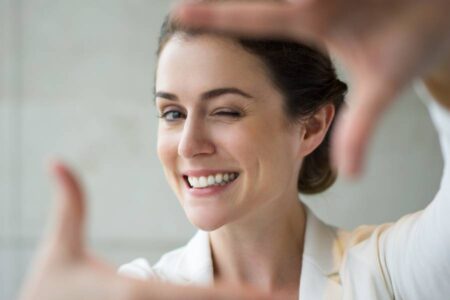 A Smiling Woman represents Our Aesthetic Treatments