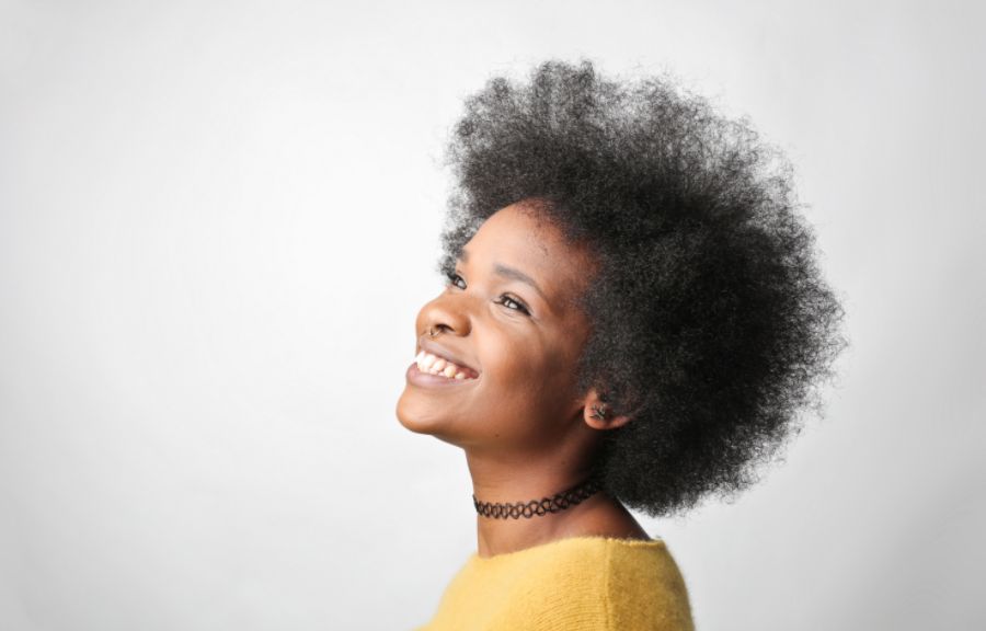A Young Woman Smiling Vibrantly
