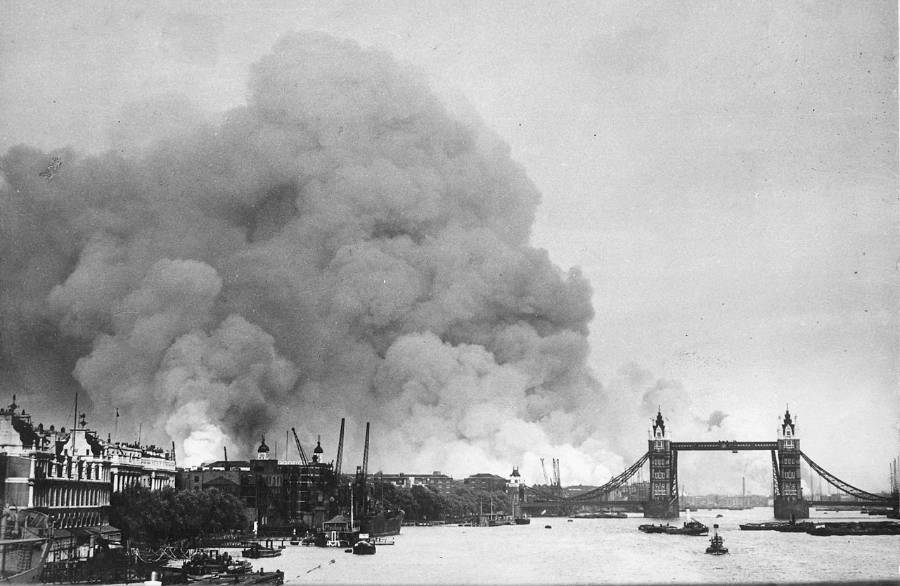 Smoke rises from London docks after the first raid of the Blitz