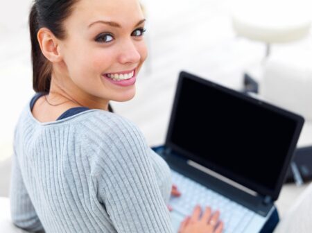 Woman Sitting Couch Laptop